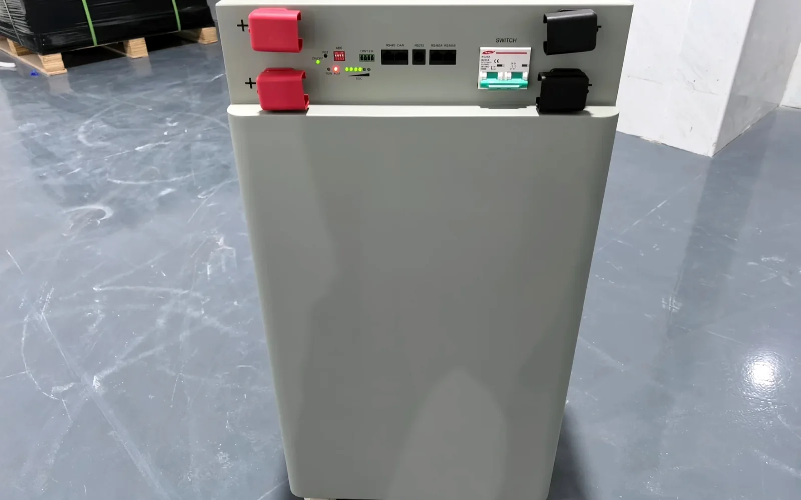 Real white floor-standing battery enclosure used as a 51.2V assembly kit reference