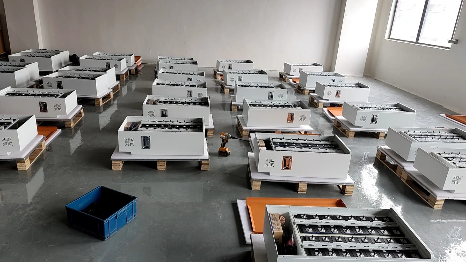 Battery enclosures and cells prepared in batches for assembly
